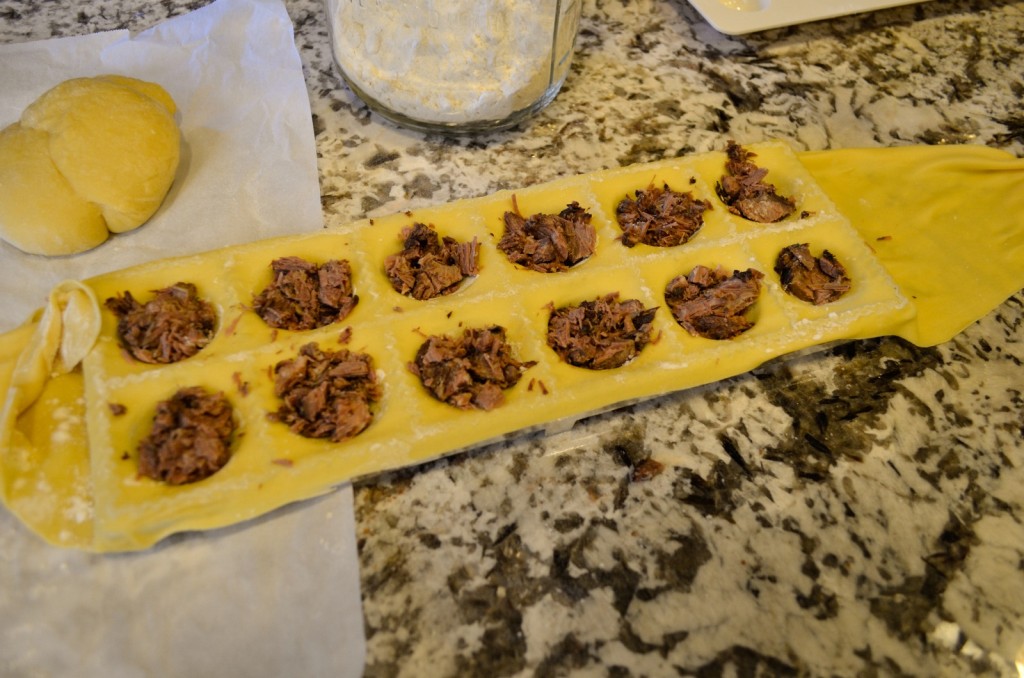 I find that a ravioli mold makes this much quicker.